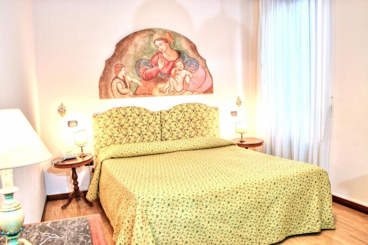 Hotel Torcolo "Residenze Del Cuore" เวโรนา ภายนอก รูปภาพ