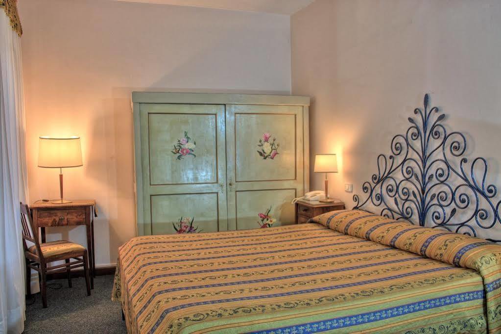 Hotel Torcolo "Residenze Del Cuore" เวโรนา ภายนอก รูปภาพ
